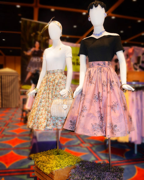 Mannequin styled with Princess of the Forest 4 in 1 headband, white top, and matching Jivin' Skirt displayed at a Dapper Day event booth