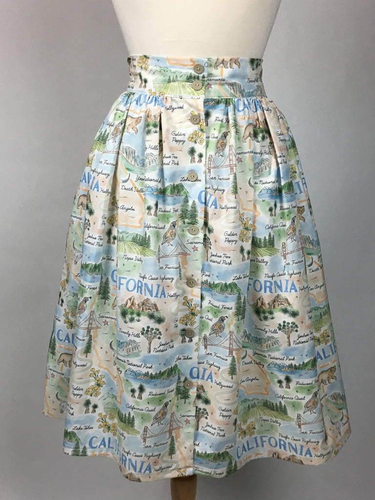Aurora Skirt in the Californio print, a gathered cotton skirt featuring California landmarks and vintage-inspired map illustrations.