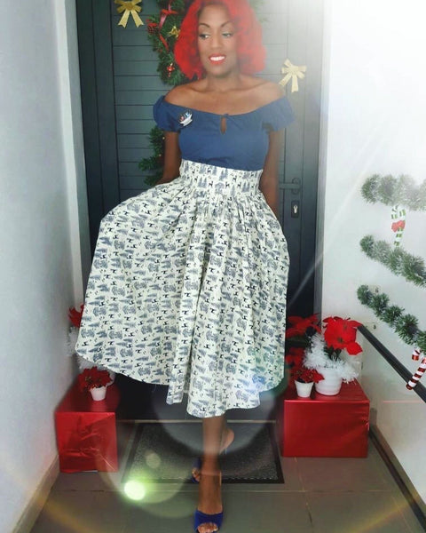 Model wearing the Ella Mae Skirt in the Queen of the Forest print featuring a wide waistband, full gathered silhouette, and deep pockets.