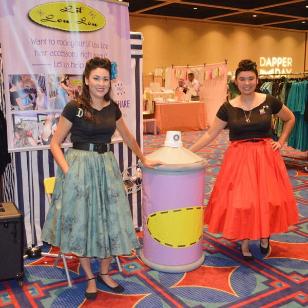 Lil' Lou Lou designer wearing the Morticia's Garden Green Jivin' Skirt at the Lil' Lou Lou booth during Dapper Day.