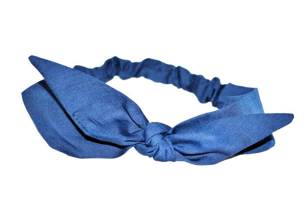 Lil' Lou Lou 4 in 1 Navy Headband with removable bow shown on a white background.