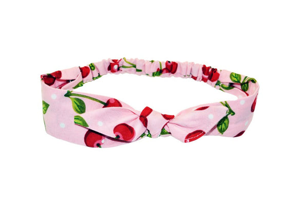 Pink Cherry Dots 4 in 1 headband with removable bow, pink fabric with red cherries and white polka dots.