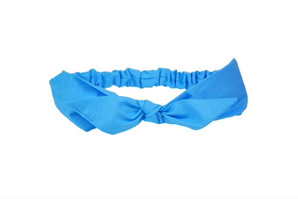Blue 4 in 1 headband with removable bow shown in flat view