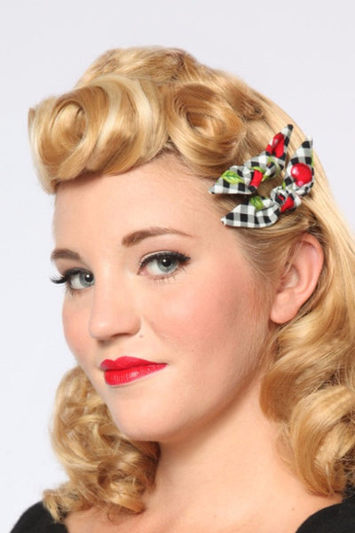 Model wearing Cherry Picnic Cute Knotted Bows with a vintage 1940s inspired hairstyle and pin curls.