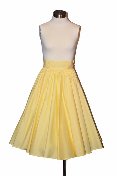 Vintage-inspired yellow Jivin' Skirt with a full gathered silhouette, high waist, and side pockets.