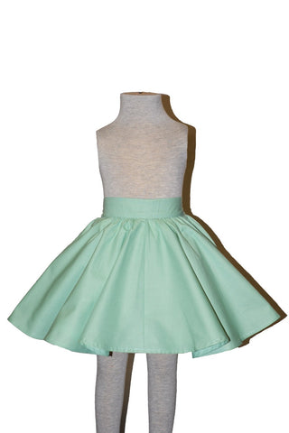 Seafoam green Kids Jivin' Skirt by Lil' Lou Lou featuring a vintage inspired circle skirt silhouette with elasticized back waistband.