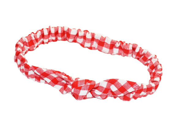 Red gingham Mommy & Me Headband with elasticized band and knotted bow detail for babies and toddlers.