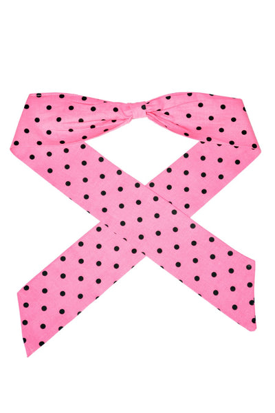 Pink and black polka dot Bombshell Hair Wrap made from cotton fabric, shown tied flat with long scarf ends