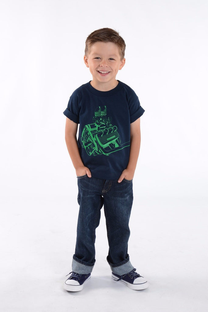 Child wearing the Flathead Engine Tee in navy featuring a bright green vintage engine graphic inspired by classic car culture.