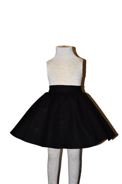 Black Kids Jivin' Skirt by Lil' Lou Lou featuring a full circle skirt silhouette and elastic waistband.