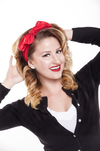 Model wearing Lil' Lou Lou Minnie Headband in solid red featuring an oversized side bow and vintage-inspired hair scarf styling.