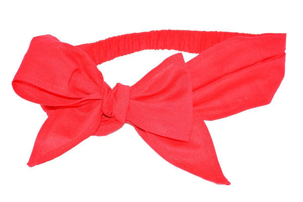 Vintage-inspired red Minnie Headband with oversized bow, scarf-style band, and elasticized back by Lil' Lou Lou.