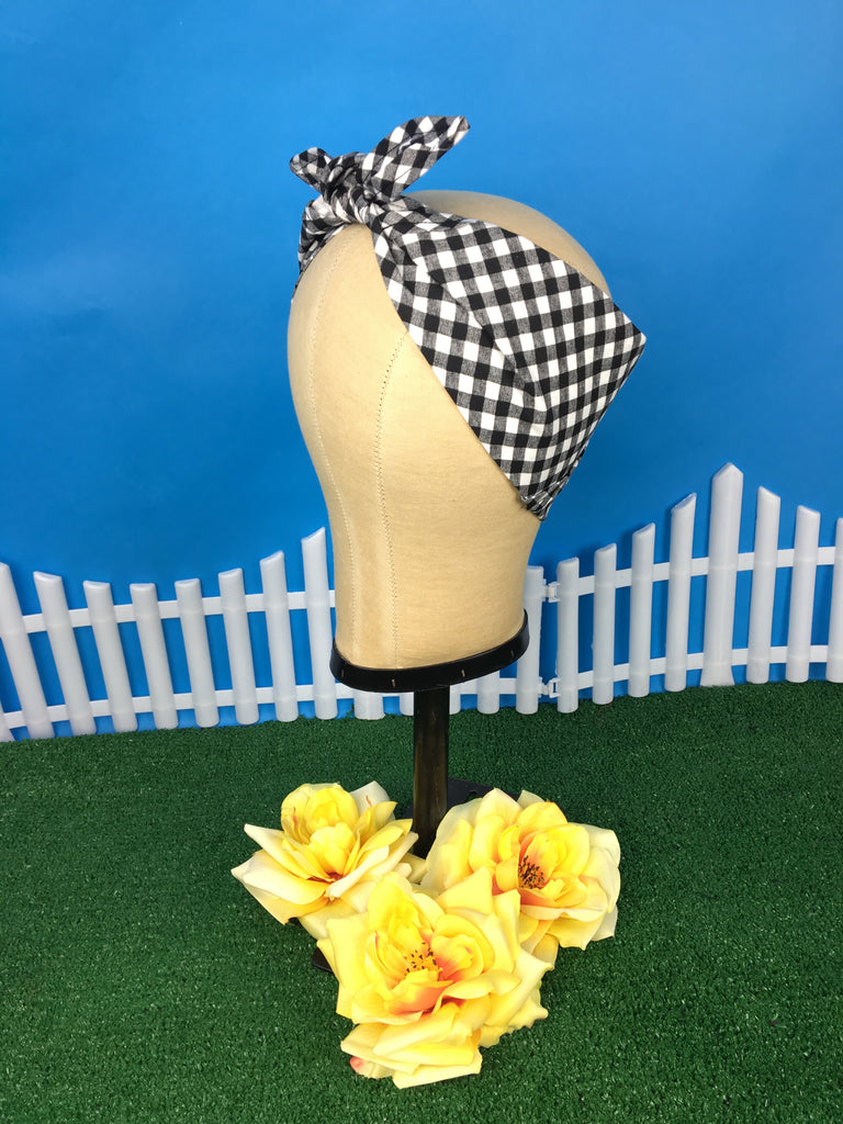 Black Picnic Rosie Bandana featuring black gingham print displayed on a mannequin head with April Moon Roses.