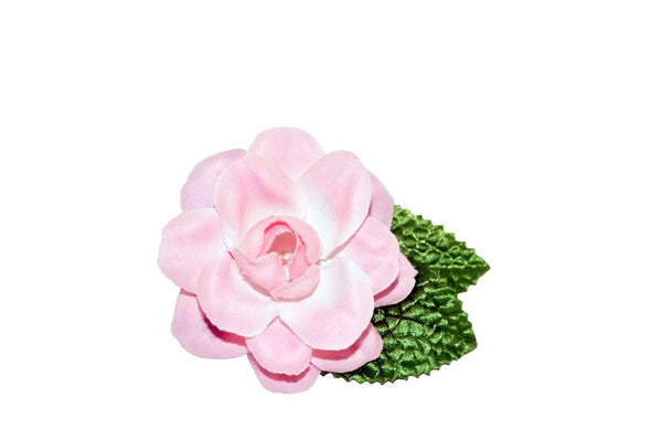 Pink vintage-inspired Rosita hair flower with green leaves and metal clip.
