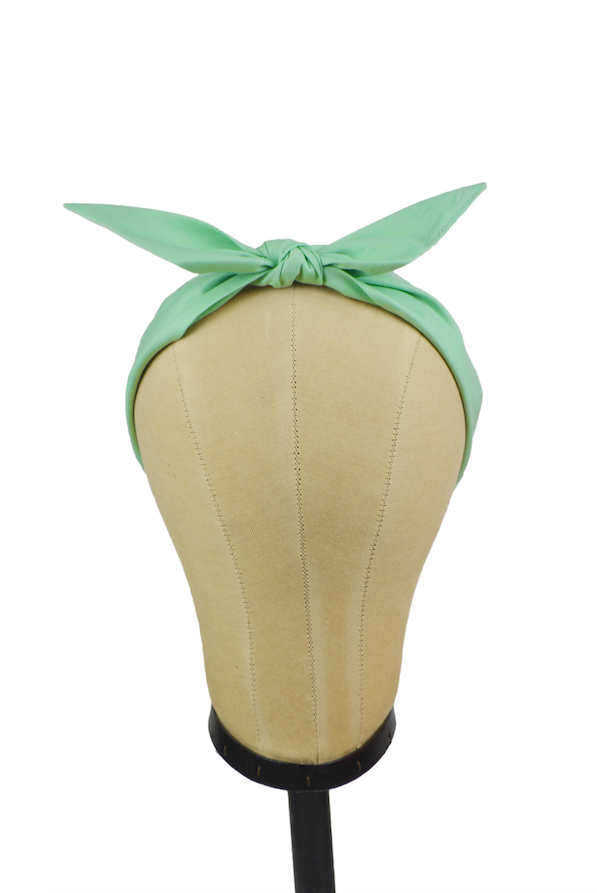 Seafoam Green 4 in 1 Headband displayed on a mannequin with removable bow centered on top