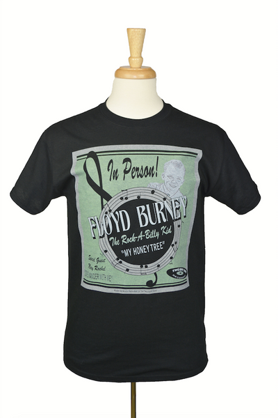 The Wandering Man graphic tee displayed on mannequin featuring original Floyd Burney concert poster artwork by Lily Gómez