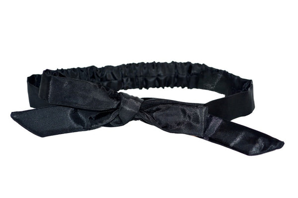Black taffeta Tracy Headband featuring an adjustable bow and elasticized back band.
