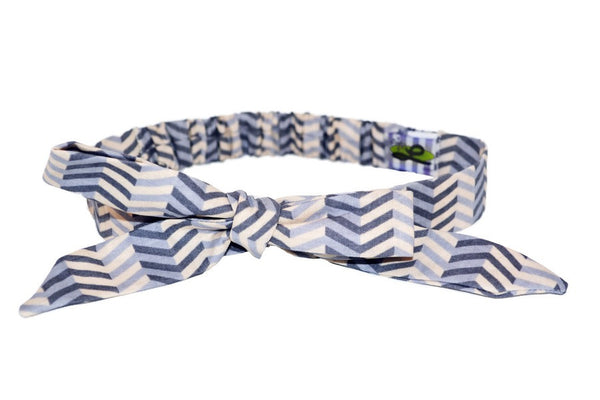 Grey chevron Tracy Headband featuring an adjustable bow and elastic back.